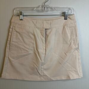 Puma Women’s golf skort size 4, tan khaki